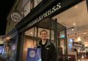 Zac Lewis in front of Pizza Express