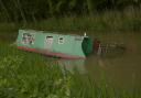 Narrowboat sinking in the Kennet and Avon canal