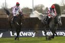 Who Dares Wins and Tom Cannon clear the last fence on Saturday.	                    PHOTO: PA