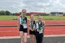 Prosser sisters Meredith, Carys, Lowri with their medals at the Wiltshire Track and Field Championships at the County Ground in Swindon