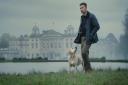 Theo James in front of Badminton House in a scene from The Gentlemen