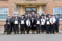 Police officers and senior staff pose with the High Sheriff of Wiltshire