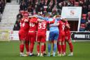 Swindon played out a high-scoring draw with Morecambe