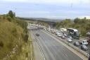 Traffic is being held up on the M4 between junction 15 and Membury Services.