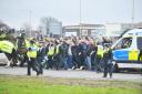 Oxford United fans are escorted by police before the match with Swindon Town on February 5. Picture by Thomas Kelsey