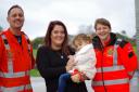 Sam Pothecary and her daughter Mia with Wiltshire Air Ambulance Critical Care Paramedics Richard Miller and Louise Cox