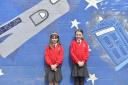 Aloeric Primary Melksham School Focus feature. .L-R  Lucy and Sophia stood next to the Doctor Who mural.. April 2017. .Pictures by Diane Vose DV5535/12.