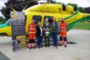 Valerie Whistler, Wiltshire Air Ambulance partnerships co-ordinator with Alison and Jonathan Sinclair, owners of Lowden Garden Centre, and WAA paramedics