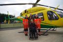 Annette Tavener with her husband Peter and Wiltshire Air Ambulance paramedics Louise Cox and Steve Riddle.