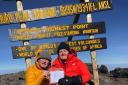 Kathy and Tommy Mckee at the summit of Mount Kilimanjaro in Tanzania