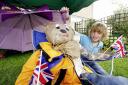Jack Fairlie goes under cover with his scarecrow, celebrating the great British weather