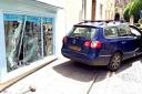 The blue Volkswagen estate which rolled down Church Street, Calne, and hit a shop window