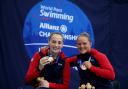 Great Britain's Tully Kearney and Suzanna Hext poses with their gold and bronze medal in the Women's 100m Freestyle S5 Final during day seven of the World Para Swimming Allianz Championships at The London Aquatic Centre, London. PA Photo. Picture