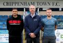 New Chippenham Town signings Alefe Santos (left) and Daniel Griffiths (right) either side of chairman Neil Blackmore