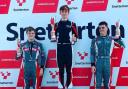 Swindon racer Lucas Romanek proudly stands on top of the podium after his win at Snetterton during the Formula Ford Championship last weekend