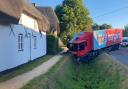 A Home Bargains lorry almost hit a thatched house on the A338 last month (Photo: SWNS)