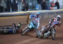 Speedway action between Poole Pirates and Swindon Robins at Wimborne Road.  Heat 7  Hans Andersen in the middle as Nick Morris slides into the air cushion..