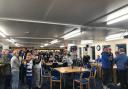 Chippenham supporters pack out Bluebirds Bar during the FA Cup second round draw.