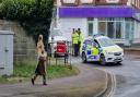 A ''suspected grenade' saw police head to a quiet road near Waitrose on Monday