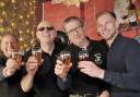 New Calley Arms landlord Jon Beeden (right) with members of the Wanborogh Old Boilers ahead of the Wanborough Beer Festival