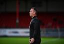 Swindon Town manager Michael Flynn on the touchline against Arsenal U21s