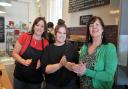Laura May, Shannon Read, and Sue Belcher celebrate 15 years of Bloomfields' Highworth deli