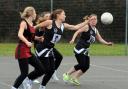 Action from Abbey Meads A (black and white tops) win over Lawn A Pictures: DAVID MORRISON