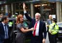 Labour leader Jeremy Corbyn is greeted by his office director Karie Murphy as he arrives at Labour Party HQ in Westminster this morning