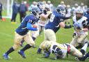 Greg Roscow (with ball) scored Swindon Storm’s sole touchdown as they were beaten by Bristol Apache
