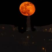 The moon is a ball of fire over Swindon, caught by Adam Staines