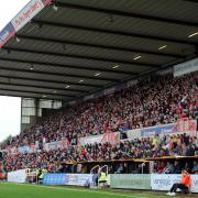 The Don Rogers Stand full during the match between Swindon Town and Rochdale at The County Ground Stadium , Swindon, England on Saturday the 16th of October 2021. The EFL League Two, Photo by Rob Noyes..