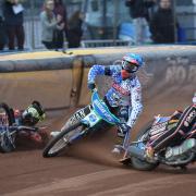 Speedway action between Poole Pirates and Swindon Robins at Wimborne Road.  Heat 7  Hans Andersen in the middle as Nick Morris slides into the air cushion..