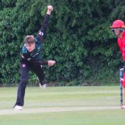 Wiltshire's man of the match, Harry Broderick bowls against Wales in the NCCA KO Trophy group game in Warminster