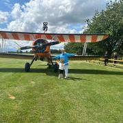 Gemma Lorains in front of her plane