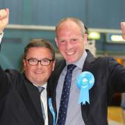 Robert Buckland and Justin Tomlinson hope they might be  celebrating as they did in 2015 at the next election. despite a difficult poll result
