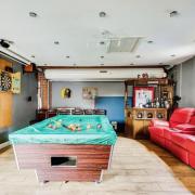The property features a games room converted from a garage.