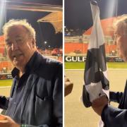 Jeremy Clarkson waves the flag at the first race of the F1 season in Bahrain