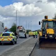 JCB helps collect roof from Great Western Way in Swindon