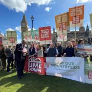 North Wiltshire MP James Gray with Stop Lime Down Solar Park campaigners at Parliament Square in London
