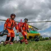 Wiltshire Air Ambulance paramedics arriving to the scene of an emergency