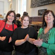 Laura May, Shannon Read, and Sue Belcher celebrate 15 years of Bloomfields' Highworth deli