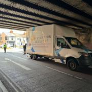 A van stuck under a bridge in Swindon