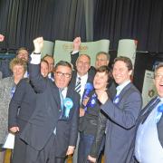 MP Robert Buckland celebrates with Conservative councillors