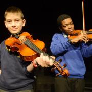 Aurelien Andre and Jason Henry at the Swindon Music Festival taking part in the Strings Grades 5-6 class 101 										            Picture: THOMAS KELSEY