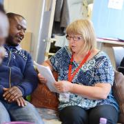 Jane Farr of the Room for All scheme plus other people at The Harbour in Swindon, who help refugees. Pictured Jane Farr talking to Alex Danso..15/06/17 Thomas Kelsey.