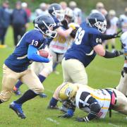 Greg Roscow (with ball) scored Swindon Storm’s sole touchdown as they were beaten by Bristol Apache