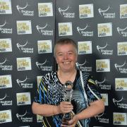 Mo Squire with her Goalden hat-trick award