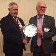 Robins co-promoter Colin Pratt (left) picks up the parliamentary award