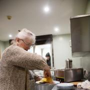 Cook Sue Gasiorek prepares breakfast at Big Breakfast Plus. Picture by Thomas Kelsey