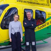 Alice Berry with Wiltshire Air Ambulance pilot George Lawrence, who airlifted Alice to Southmead Hospital after her road traffic collision on 8 January 2016